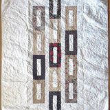 Flay lay of elegant minimal holiday handmade quilt