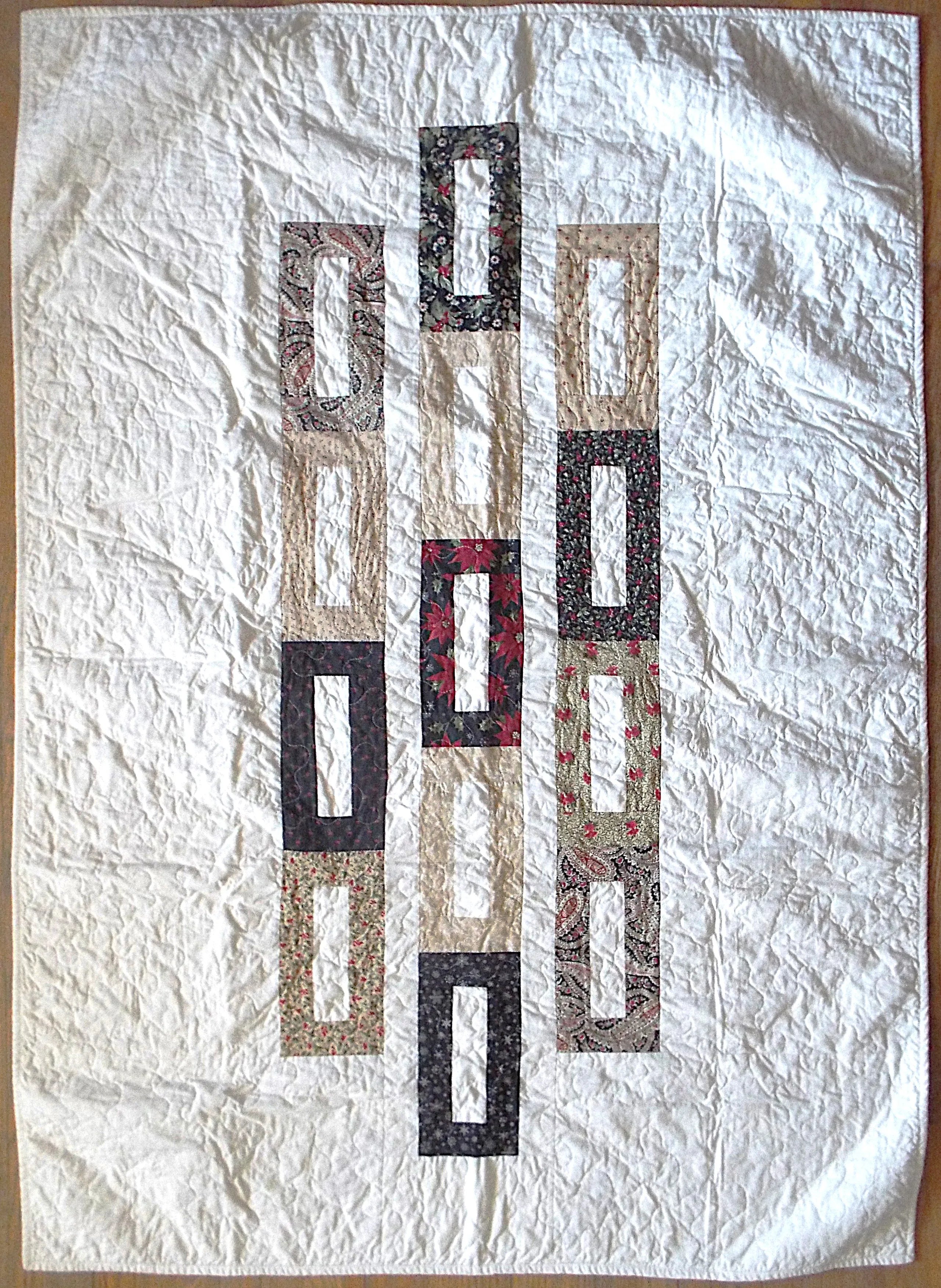 Flay lay of elegant minimal holiday handmade quilt