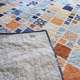Corner binding and quilting close-up showing fine craftsmanship and hand-finished quality.