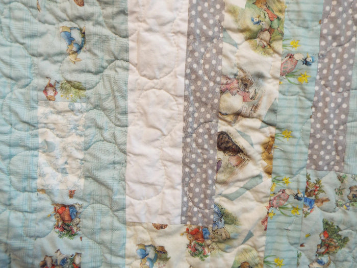 Stitching detail for Twilight Tails blue baby quilt