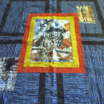 Angled lay of Air Force Eagle Throw Quilt showing more detail.