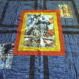 Angled lay of Air Force Eagle Throw Quilt showing more detail.
