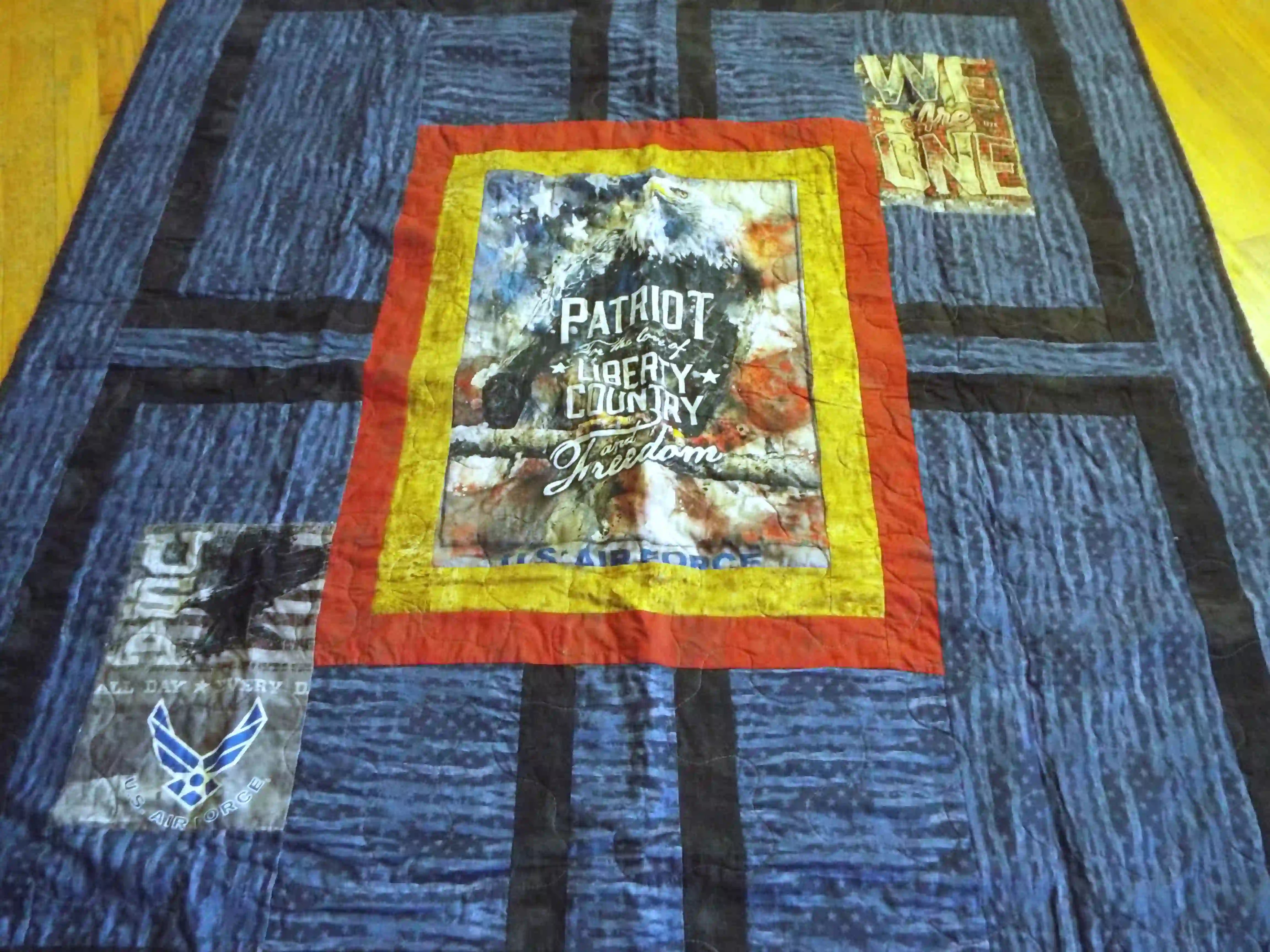 Angled lay of Air Force Eagle Throw Quilt showing more detail.