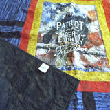 Corner of Air Force Eagle Throw Quilt shown flipped over to display backing.