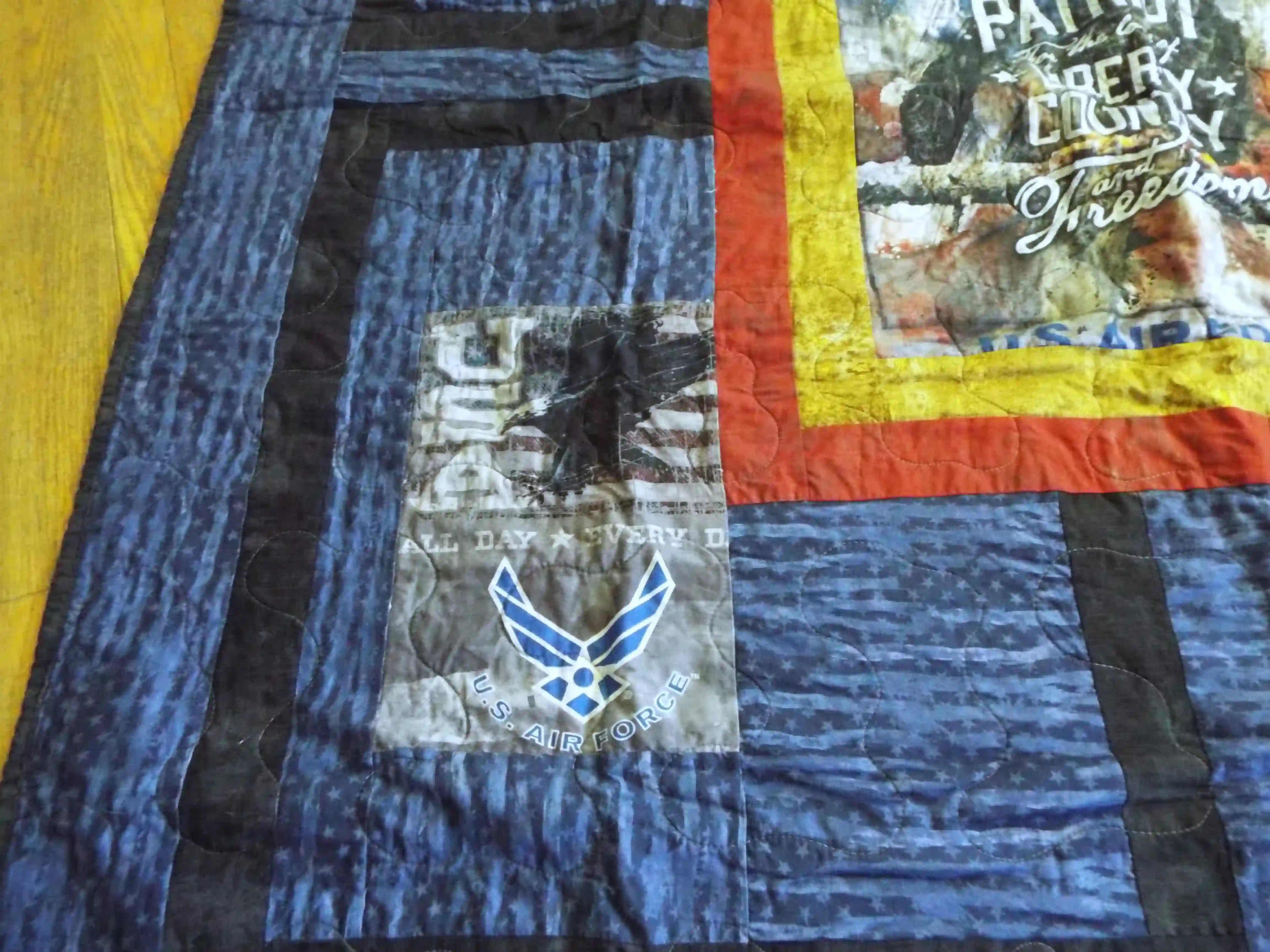 Detail of Air Force Eagle Throw Quilt showing stitching and close up of smaller panel.