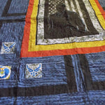 Angled lay of Air Force Airman showing more detail of the insignia patchwork in the corners of the quilt.