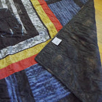 Corner flipped over on Air Force Airman Throw Quilt showing the backing of the quilt.