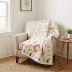 Handmade quilt shown draped over a chair in the corner of a neutral room.