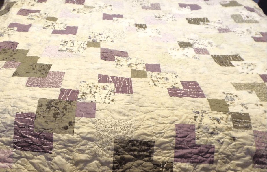 Detail shot of the Au Naturel handmade twin size quilt