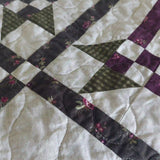 Detail shot of Avonlea Garden Twin Quilt showing quilt stitching and piecing detail.
