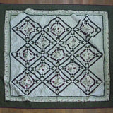 Flat lay of Avonlea Garden Twin Quilt showing entire quilt.