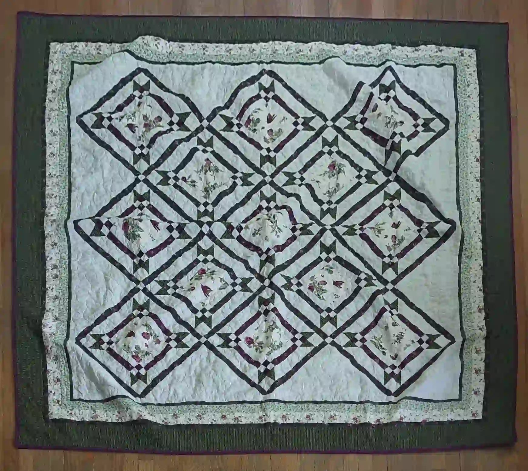 Flat lay of Avonlea Garden Twin Quilt showing entire quilt.