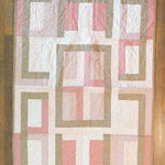 Flat lay of Blushing Pathways Baby Quilt showing entire pattern.