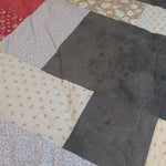 Detail shot of Bramble & Stone King quilt showing stitching detail.