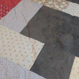 Detail shot of Bramble & Stone King quilt showing stitching detail.