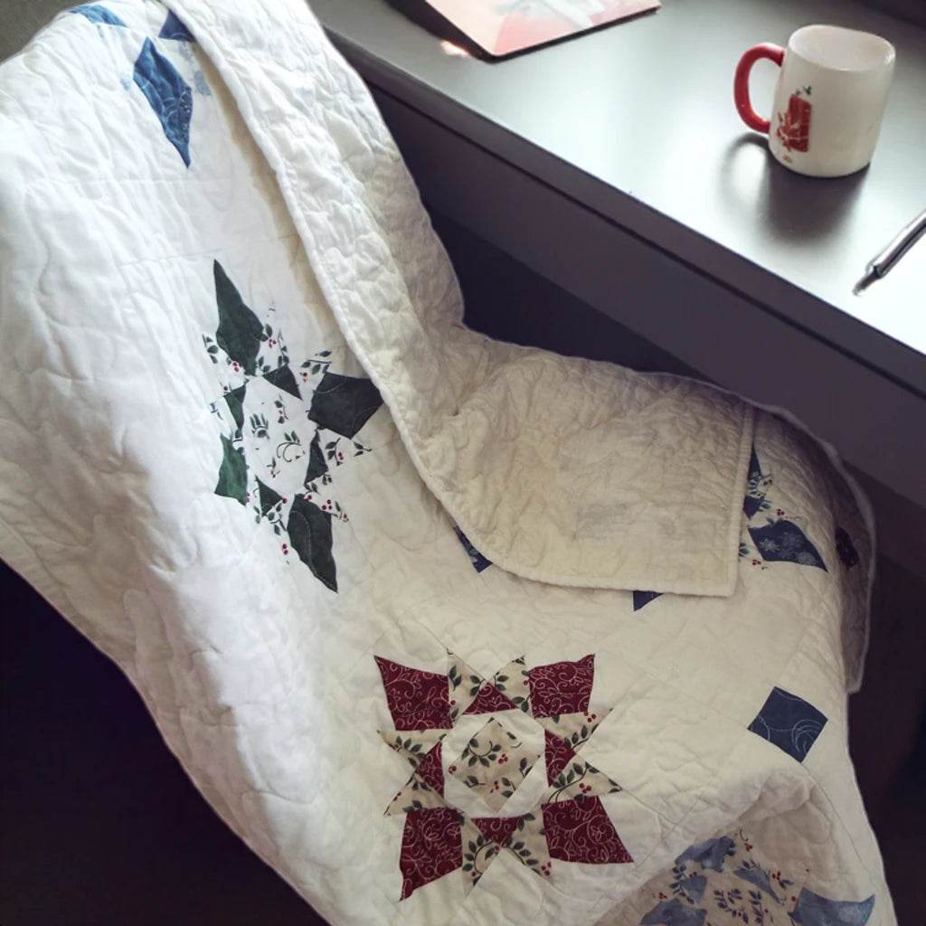 winter wonderland quilt over chair at desk
