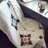 winter wonderland quilt over chair at desk