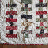 Close up of handmade chic holiday quilt
