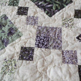 Close up of Evening Lattice showing texture from quilting and fabric patterns