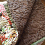Handmade floral hearts throw showing backing detail