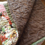 Handmade floral hearts throw showing backing detail