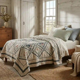 Framed Botanicals Twin Quilt shown in a farmhouse-inspired bedroom.