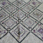 Alternate view of Gathered Correspondence Twin Quilt showing center detail.