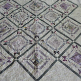 Alternate view of Gathered Correspondence Twin Quilt showing center detail.