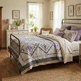 Gathered Correspondence Twin Quilt shown in cottage-core inspired bedroom.