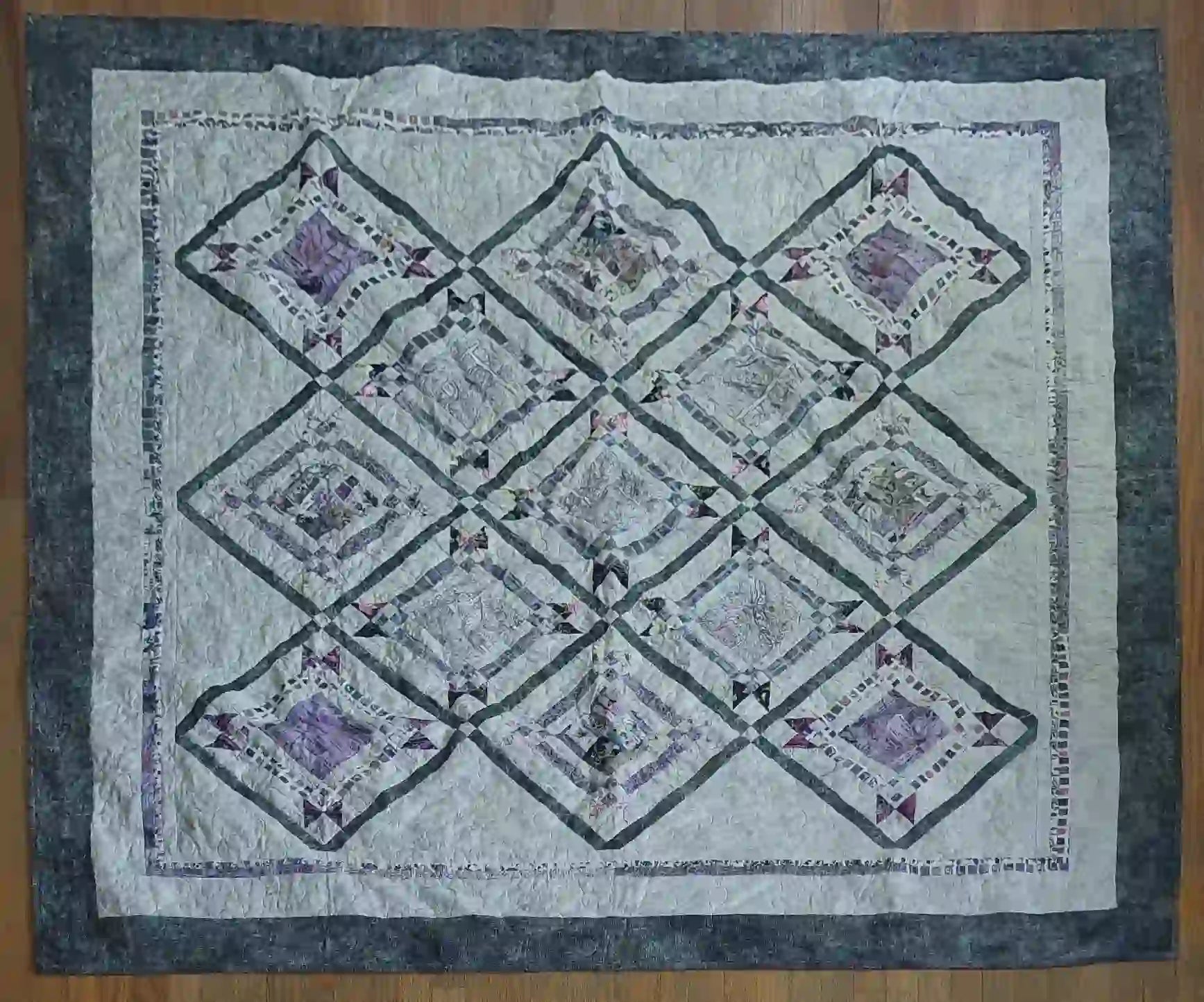 Flat lay of Gathered Correspondence Twin Quilt showing entire quilt.