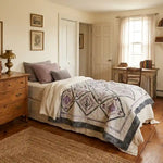 Gathered Correspondence Twin Quilt shown in academia inspired bedroom.