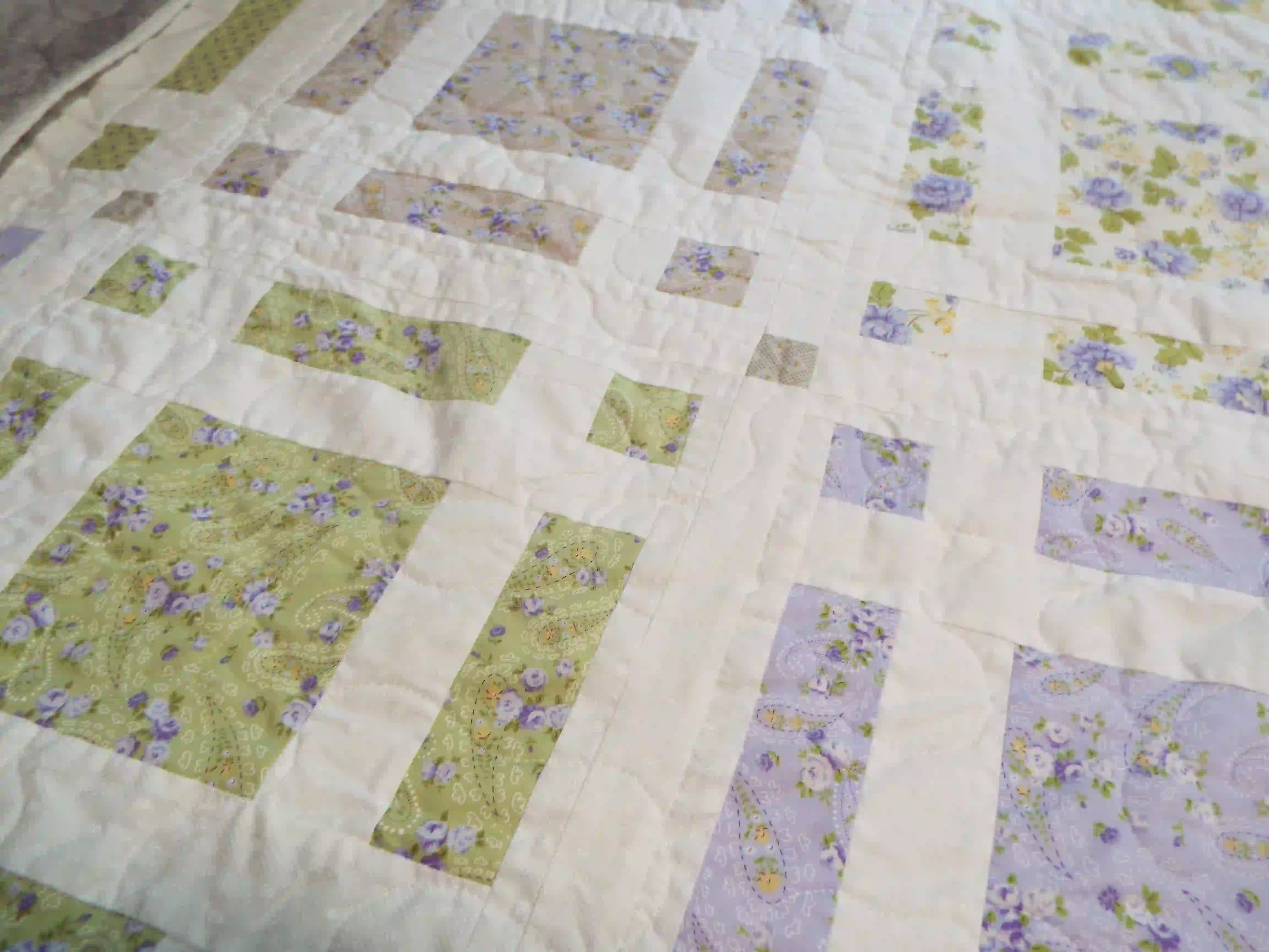 Detail of Georgian Garden showing block construction and quilt stitching