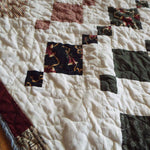 Holiday Heirloom quilt close up of fabrics and stitching