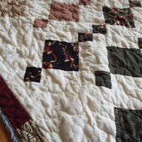 Holiday Heirloom quilt close up of fabrics and stitching