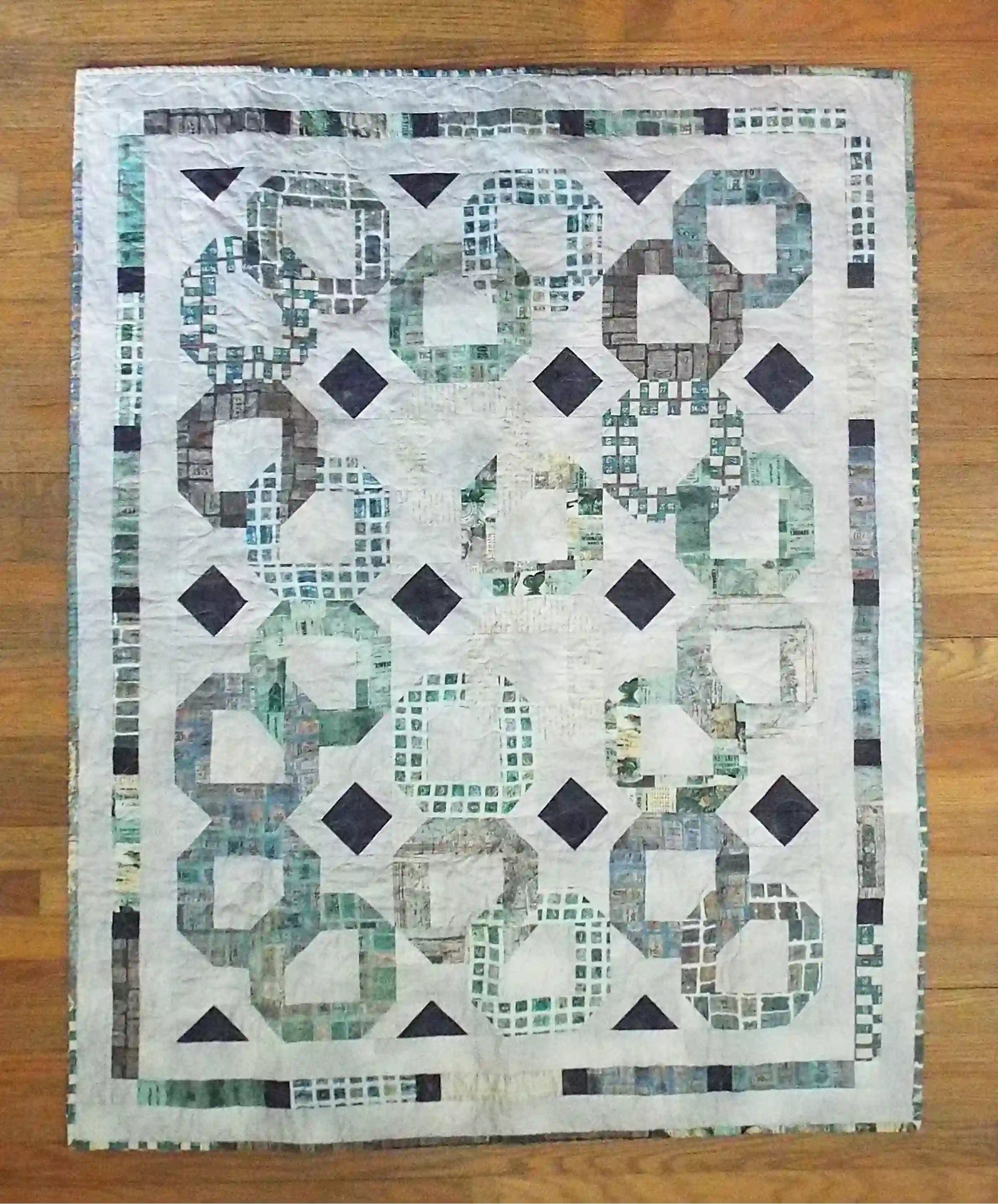 Flay lay of Links to the Past Lap Quilt showing entire quilt.