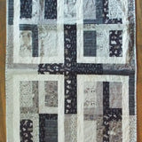 Flat lay of Little Framework Baby Quilt showing entire quilt.