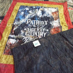 Marine Eagle Handmade Throw Quilt shown with corner flipped over to display backing.