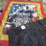Marine Eagle Handmade Throw Quilt shown with corner flipped over to display backing.