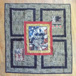 Flat lay of Marine Eagle Handmade Throw Quilt showing entire design.