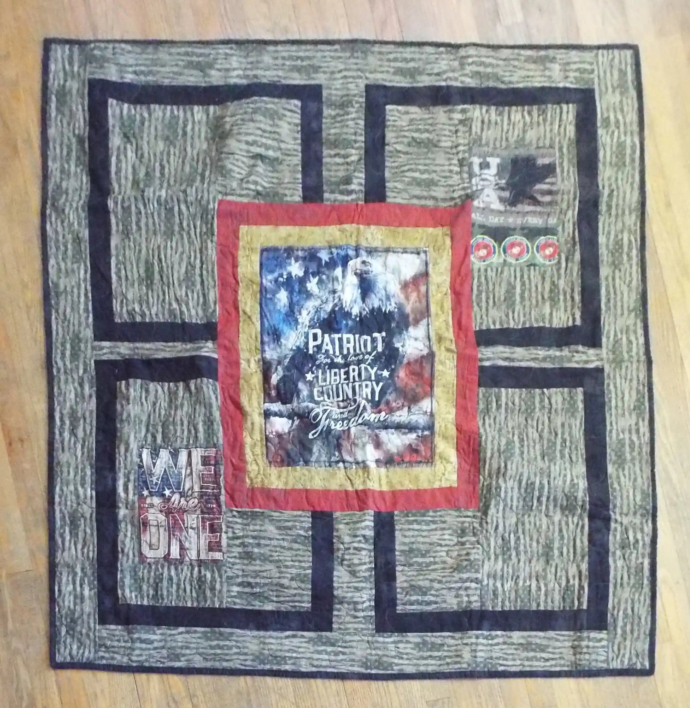 Flat lay of Marine Eagle Handmade Throw Quilt showing entire design.