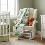 Meadow & Mischief shown draped over an upholstered rocker in a green nursery