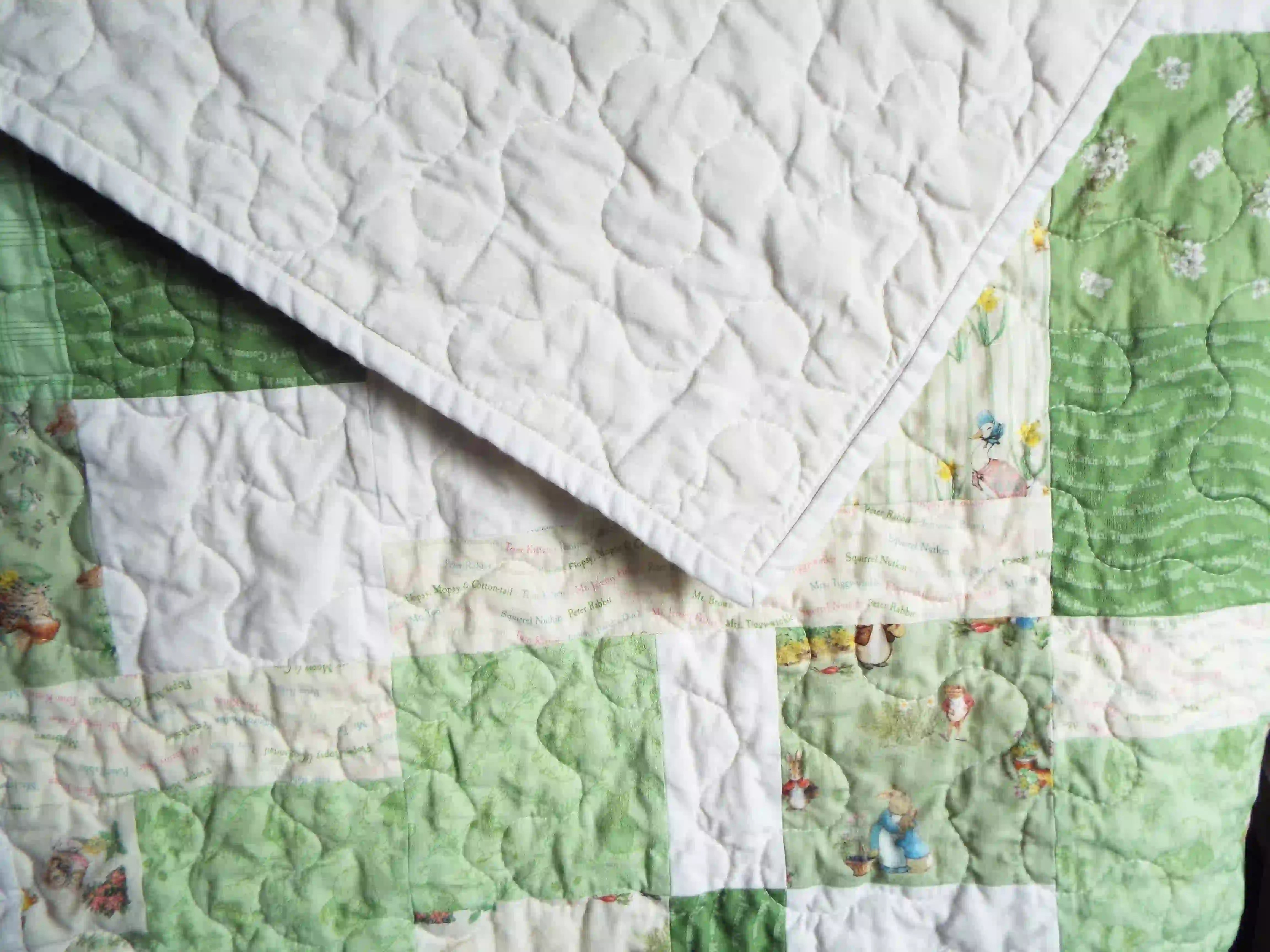 Corner flipped showing backing and stitch detail