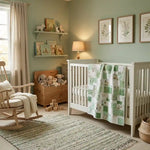 Meadow & Mischief draped over the side of a crib in a sage nursery