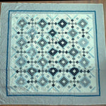 Flat lay with some wrinkles to show entire quilt