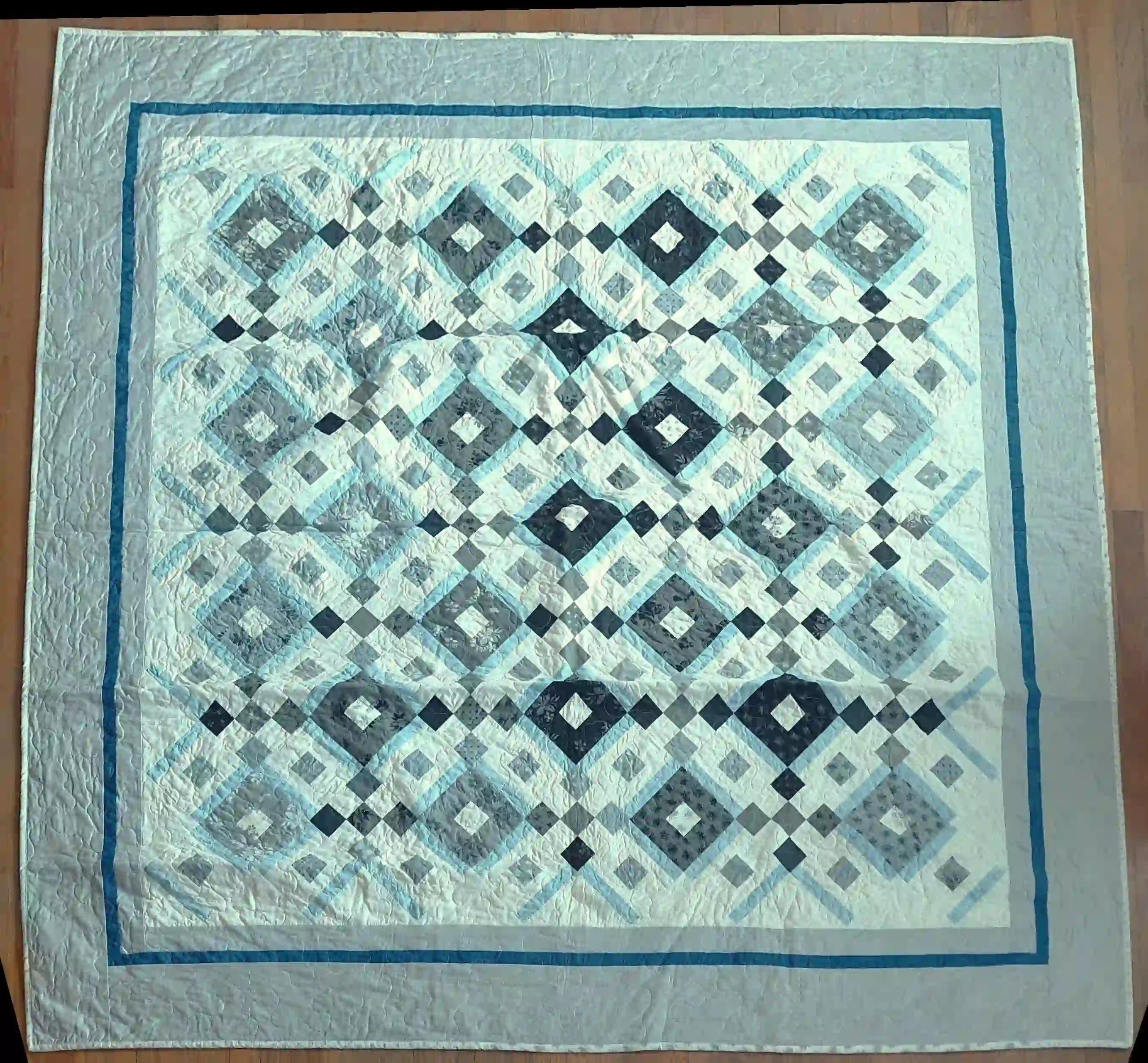 Flat lay with some wrinkles to show entire quilt