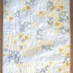 Flay lay of quilt showing entire pattern.