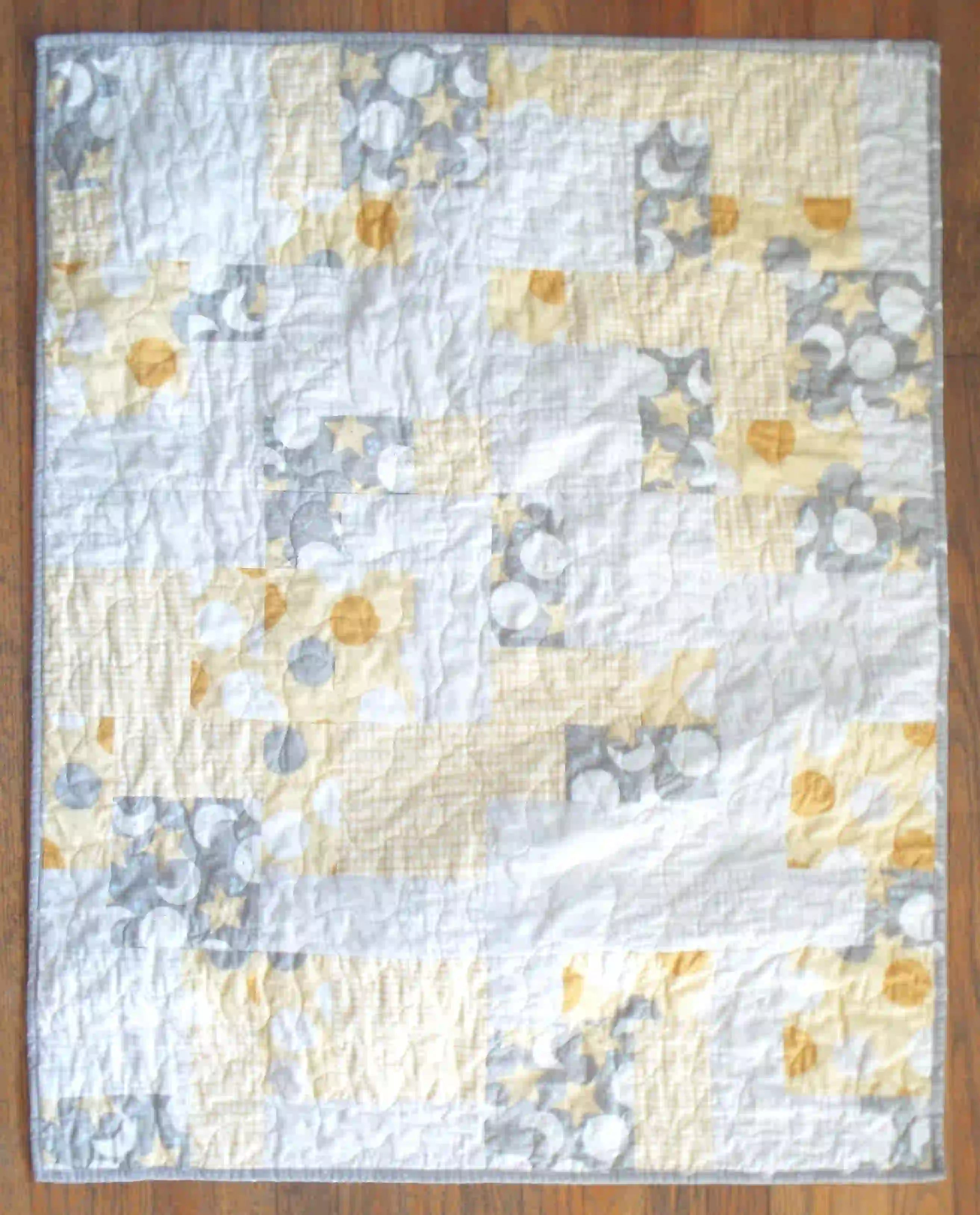 Flay lay of quilt showing entire pattern.