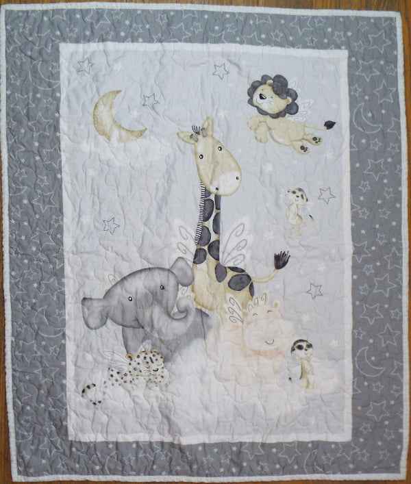 Whole cloth quilt showing animals of the savannah in the clouds getting ready for sleep