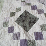 Close up of Quiet Meadow showing fabric and stitching detail.