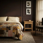Retro-Mod Orchid King in a dark sophisticated bedroom with a neutral run and wood floors